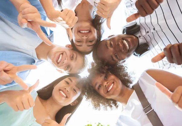 A diverse group of friends smiling together
